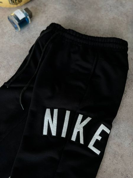 Спортивні штани Nike 40-4 фото