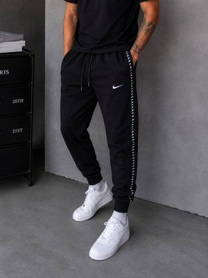 Спортивні штани Nike JR-201 фото