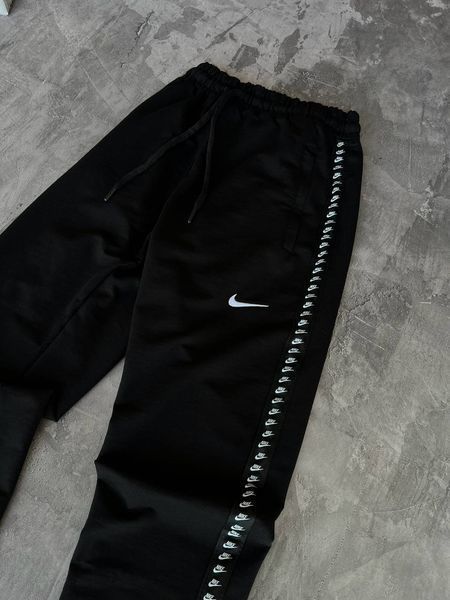 Спортивні штани Nike JR-201 фото