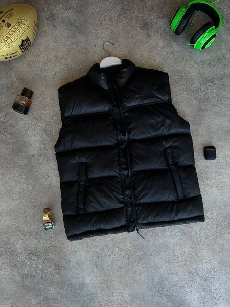 Жилетки The North Face TNF60 фото