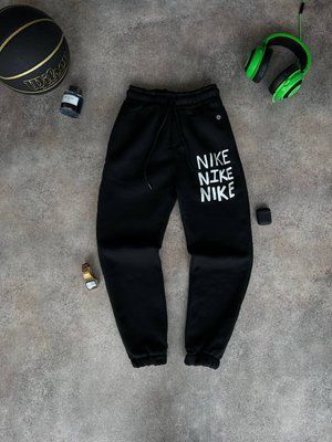 Зимние спортивные штаны Nike 100-P фото