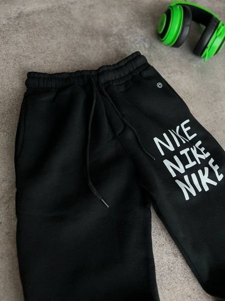 Зимові спортивні штани Nike 100-P фото